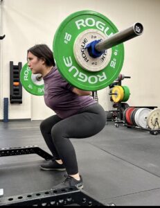 Female back squatting 50kg