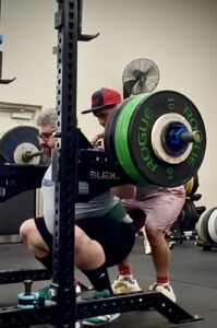 Man squatting 182.5kg