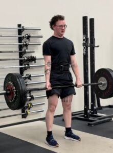 Man deadlifting 105kg